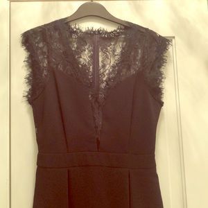 Black lace back pleated mini skirt dress size 6